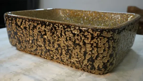 Large Altin rectangular gold artisan washbasin with shimmering crystal interior by Majestics Group.