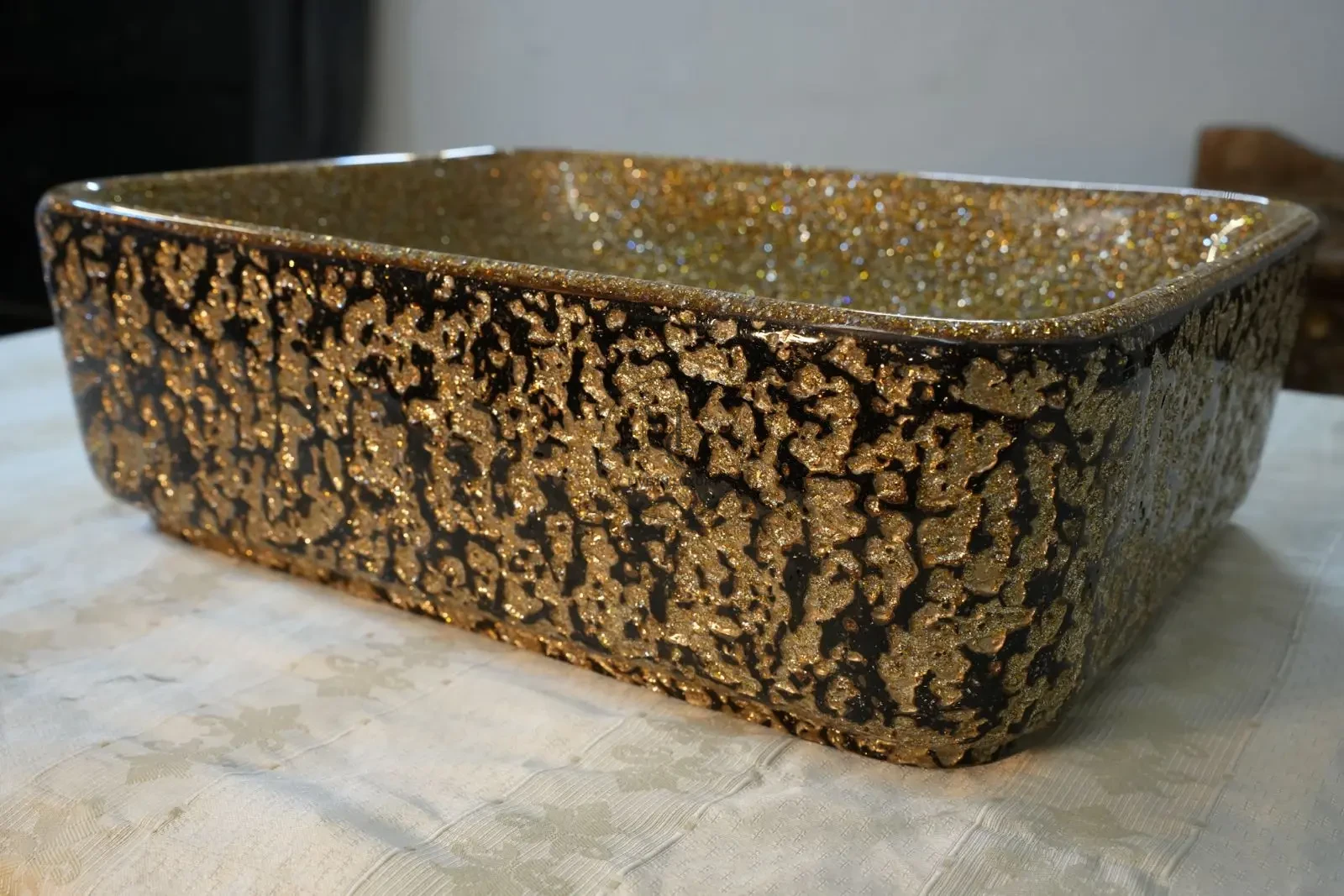Large Altin rectangular gold artisan washbasin with shimmering crystal interior by Majestics Group.