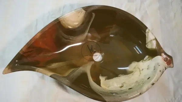 Choko Leaf-shaped artisan washbasin with chocolate and cream swirls, glossy interior, and textured exterior.