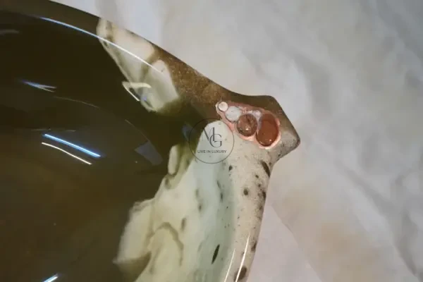 Choko Leaf-shaped artisan washbasin with chocolate and cream swirls, glossy interior, and textured exterior.