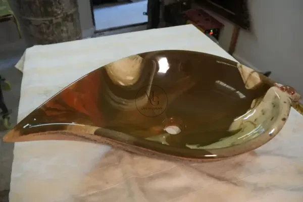 Choko Leaf-shaped artisan washbasin with chocolate and cream swirls, glossy interior, and textured exterior.